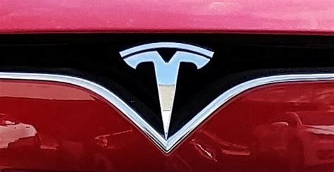 Tesla Logo Meaning and History [Tesla symbol]