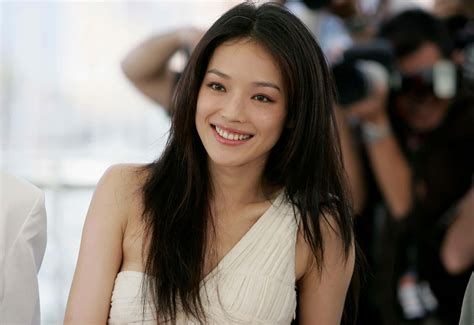 Download Shu Qi posing elegantly in a fashionable outfit Wallpaper ...