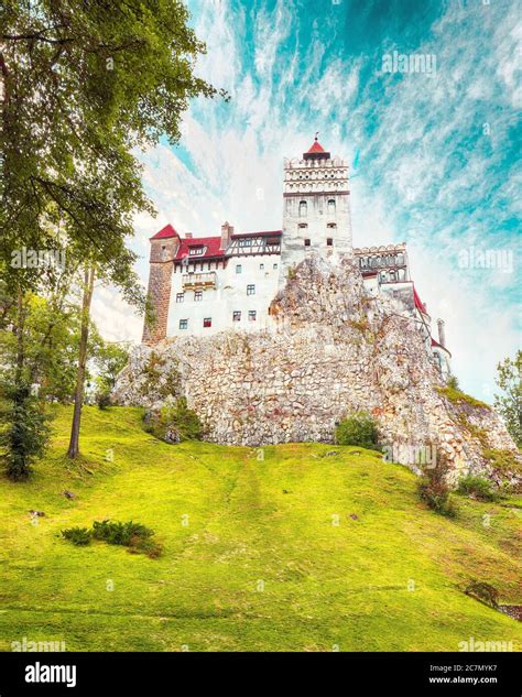 Landscape with medieval Bran castle known for the myth of Dracula. Bran or Dracula Castle in ...