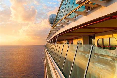 A cruise ship at sea during sunset (photo: Yevgen Belich/Shutterstock) Cruise Tips, Cruise ...