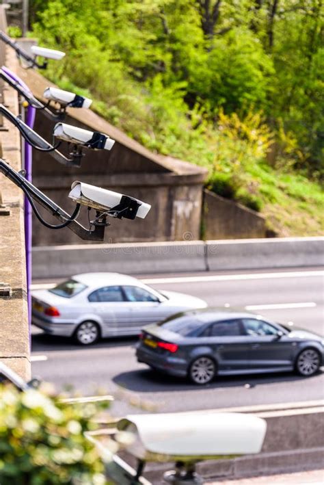 Row of Speed Cameras Monitoring Traffic on UK Motorway Stock Image - Image of britain ...