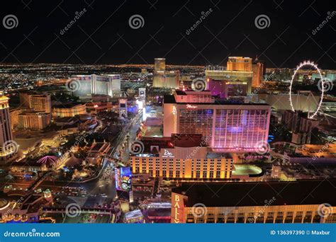 The Las Vegas Strip at Night with Ferris Wheel Editorial Image - Image of signs, hotel: 136397390