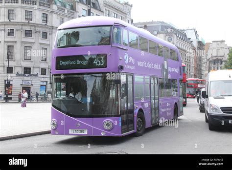 A PURPLE NEW ROUTEMASTER BUS IN LONDON ADVERTISING BARCLAYCARD Stock Photo - Alamy