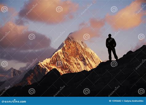 Men in mountain stock photo. Image of golden, hiker, guide - 1595682