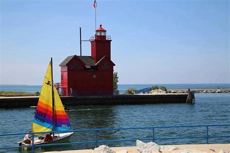 Holland Harbor lighthouse also known as Big Red Holland Michigan | Holland michigan, Lighthouse ...