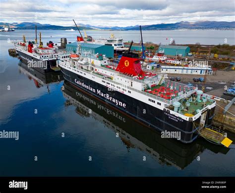 Glen Sannox ferry in dry dock at Greenock. Three other Caledonian Macbrayne ferries are ...