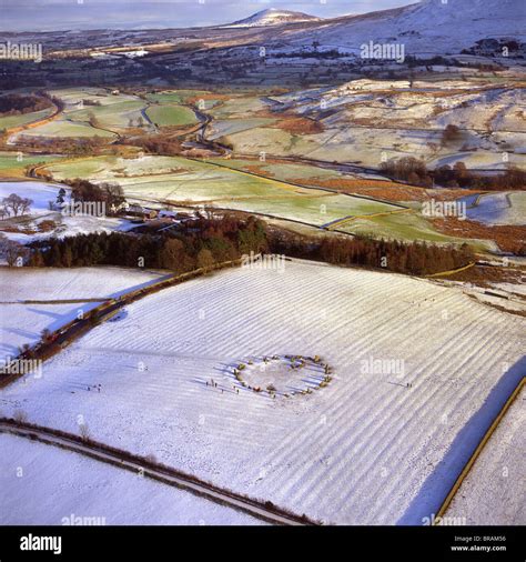 Aerial image of Castlerigg Stone Circle, a prehistoric monument in snow, near Keswick, Lake ...