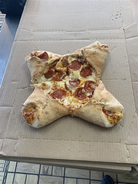 I tried my hand at the little caesars calzone pizza. Any tips for improvement? : r/Dominos