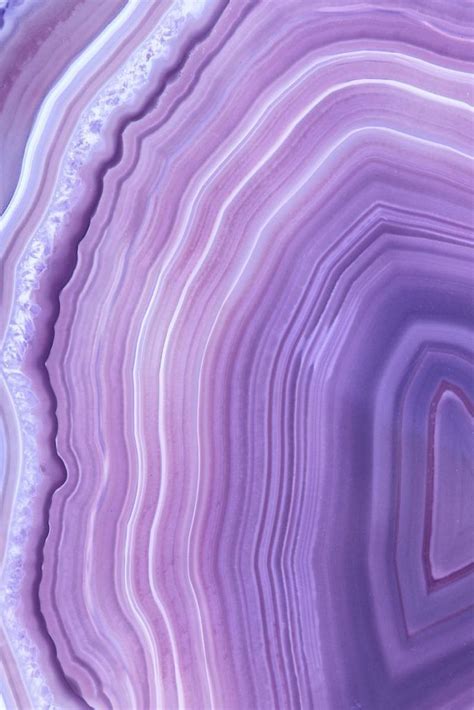 an abstract purple and white marble background