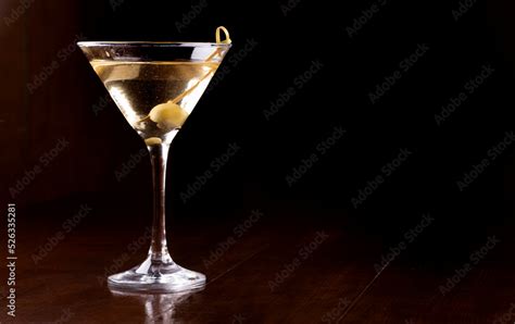 martini cocktail glass with olive. James Bond 007's Vesper Stock Photo ...