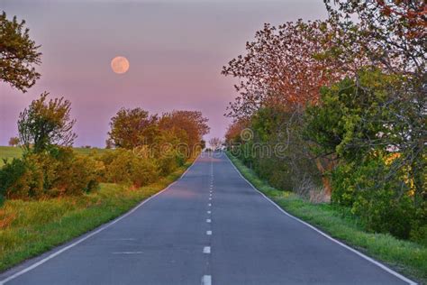 Empty road at sunset stock image. Image of dawn, full - 63745585