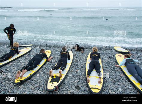 Surfing lessons, Miraflores suburb, Lima, Peru Stock Photo - Alamy