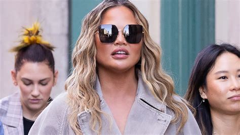 Chrissy Teigen teases epic transformation as she dyes blond hair RED | The Irish Sun