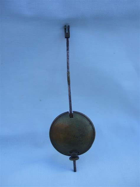 Antique Brass Adjustable Clock Pendulum. -- Antique Price Guide Details Page