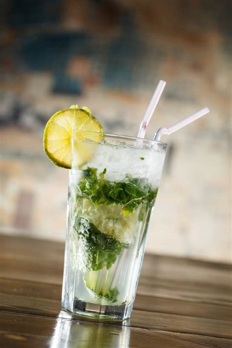 Mojito in the bar stock photo. Image of mint, green, water - 19012010