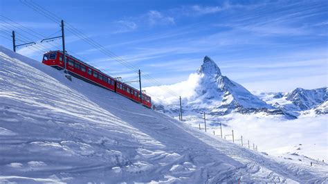 Download Train Swiss Alps Winter Landscape Wallpaper | Wallpapers.com