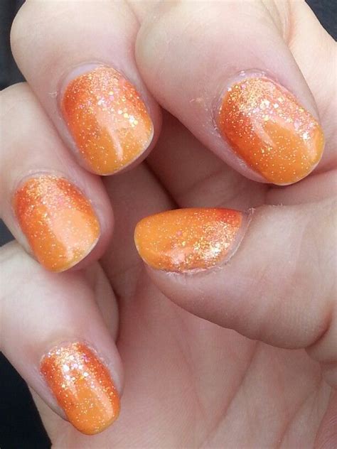 Sunburst nail art design. Orange on orange glitter gradient. | Glitter nail art, Nail art, Nails