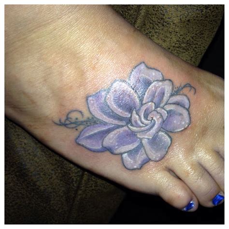 Gardenia tattoo - purple instead of grey or black shading. Hmmmmmm ...