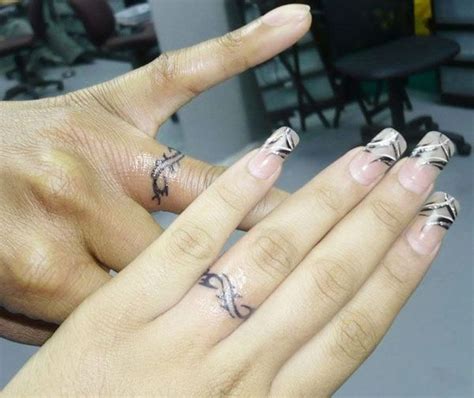 48 Sweet Wedding Ring Tattoos | Ring tattoo designs, Wedding finger tattoos, Finger tattoos for ...