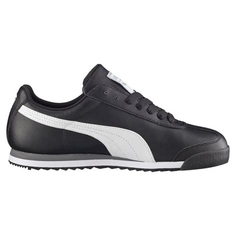 a black and white puma sneaker with an upper lace on the side,