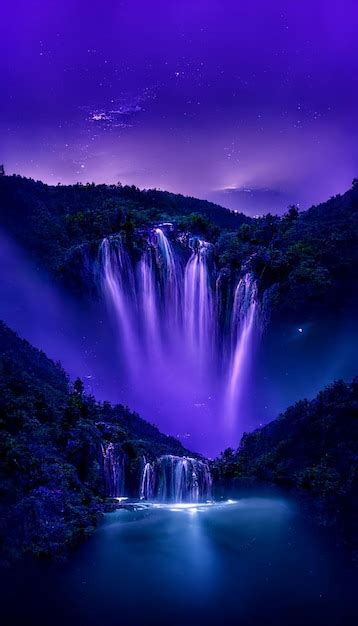 Premium AI Image | A purple waterfall in the night