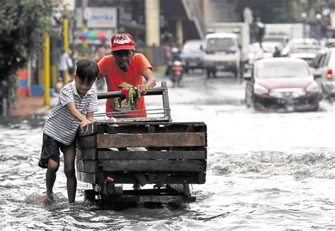 Metro Manila cools down as ‘Domeng’ brings flood | Inquirer News