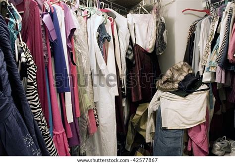 Messy Unorganized Closet Full Hanging Clothes Stock Photo (Edit Now) 42577867