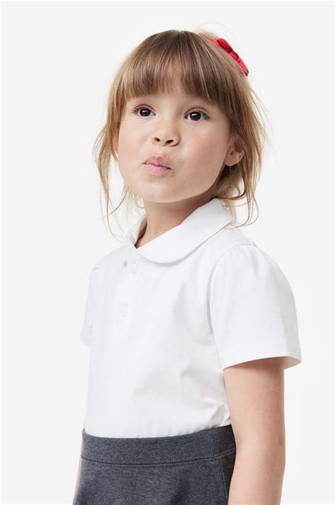 Cotton Polo Shirt - Short sleeve - Regular length - White - Kids | H&M CA