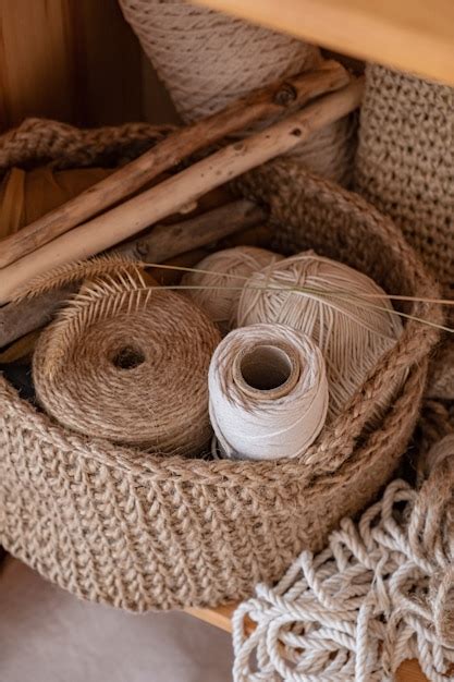 Premium Photo | Macrame, cotton and hemp ropes in skeins. crocheting, netting handicraft objects ...