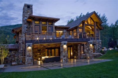 Lodge Home Exterior in Steamboat Springs - large support brick columns ...