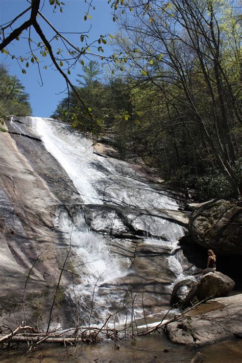 Stone Mountain water falls with a spectator at the base. | Waterfall, Water, Stone mountain