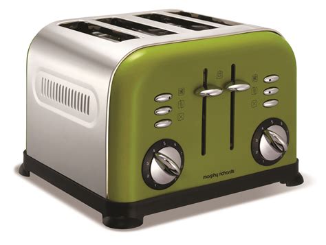 a green and silver toaster sitting on top of a white table