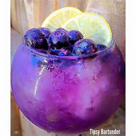 BOO-BERRY BALL 1 oz. (30 ml) Blueberry Vodka or Rum 1 oz. (30 ml) Viniq Shimmery Liqueur 2 ½ oz ...