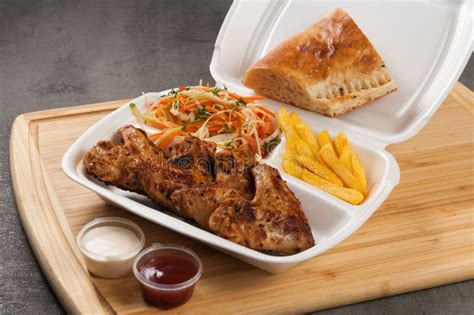 Grilled Chicken Wings in a Plastic Container. Concept: Food Delivery Stock Image - Image of ...