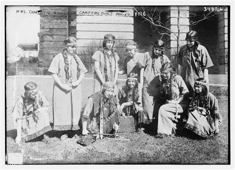 Mrs. Charlotte Gulick of Campfire Girls making fire | Library of Congress