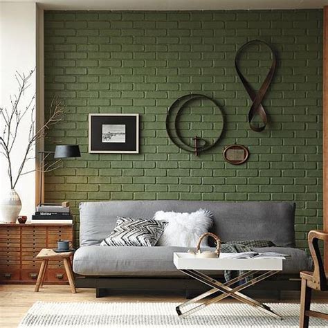 sage green brick wall and a grey sofa | Living room decor gray, Brick ...