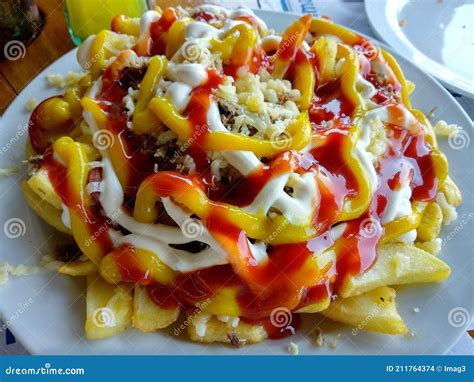 Papas Locas Served in a Restaurant Stock Photo - Image of locas, sausages: 211764374