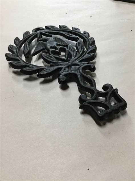 Vintage Cast Iron Trivet - Etsy