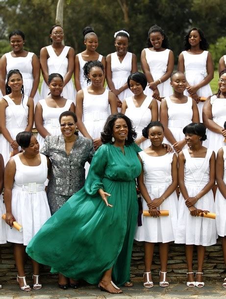 Cultural Toast - Oprah Winfrey posing in South Africa with her...