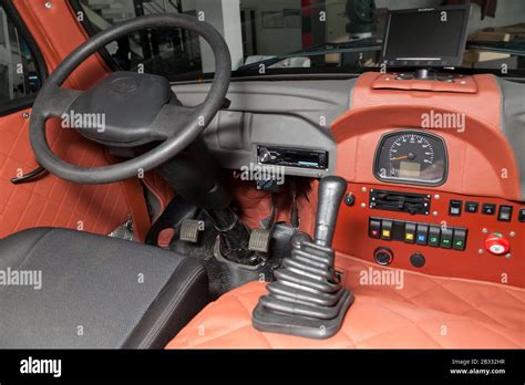 Novosibirsk, Russia - 02.26.2020: Red interior of used UAZ VAN 452 469 car with dashboard ...