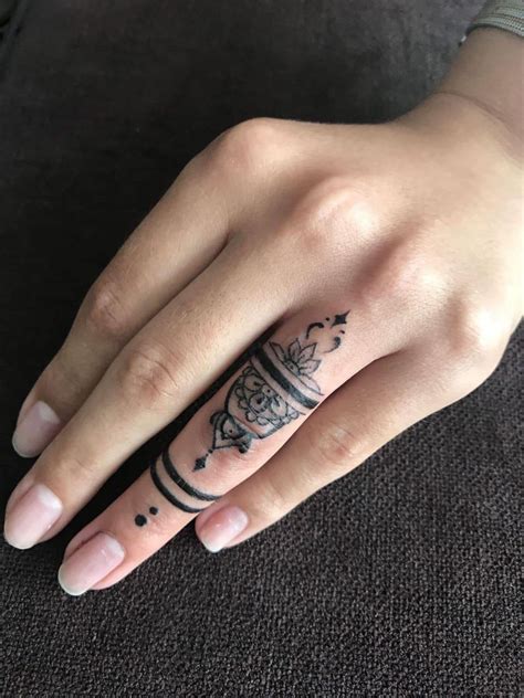 Subtle Beauty: 25 Delicate Finger Tattoos to Elevate Your Look.