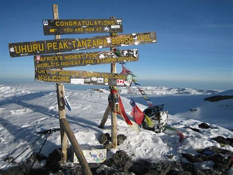 New Summit Sign on Mount Kilimanjaro - Thomson Treks | Kilimanjaro, Tanzania, Adventure