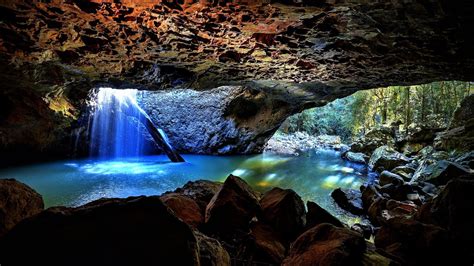 Cave waterfall at Natural Bridge, Springbrook National Park - backiee