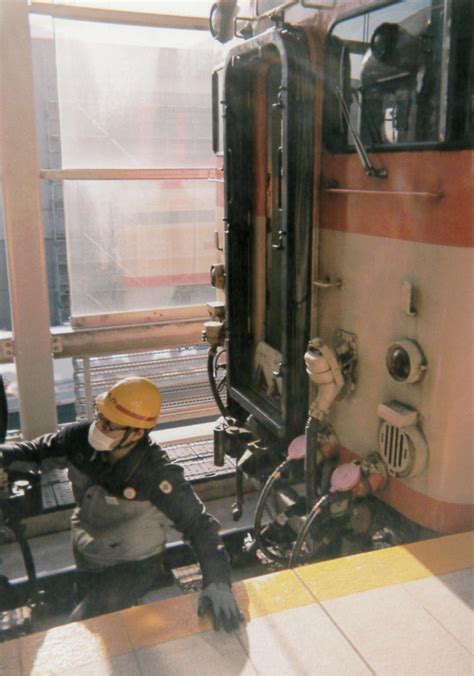 A train worker before departure in Nagasaki, Japan [fujifilm simple ace ...