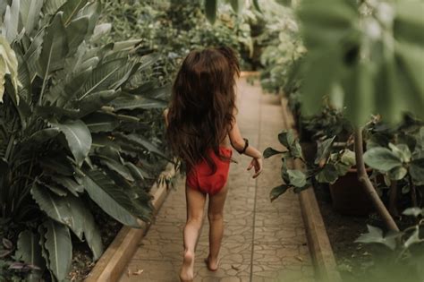 Premium Photo | Mowgli indian little girl in a loincloth hides hiding ...