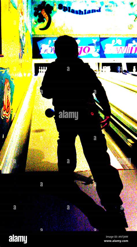 A six year-old, bowling at ‘Splashland’, Trecco Bay near Porthcawl in South Wales. The picture ...