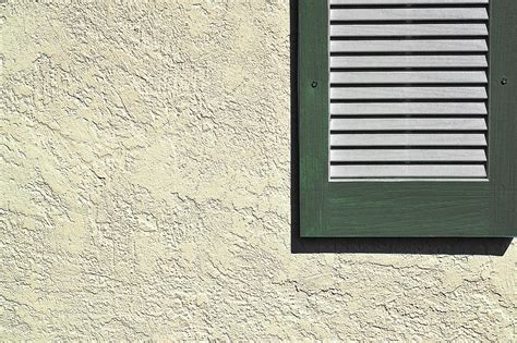 Beautiful stucco wall with shutters! | Stucco siding, Stucco exterior, Stucco