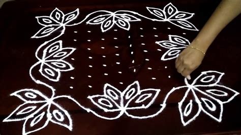 Beautiful lotus flowers kolam with 11-11 straight | chukkala muggulu with dots| rangoli design ...