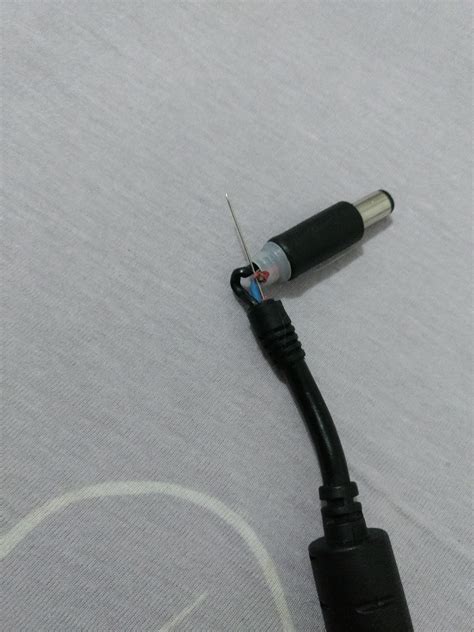 One of the wires inside the cable on my laptop charger broke, that's how I fixed it ...