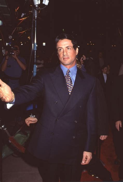 Sylvester Stallone Navy Suit With Arm Out At "Titanic" Premiere Photo Print (16 x 20) - Item ...